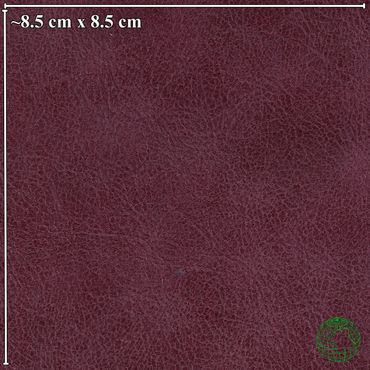 Close-up of textured burgundy leather surface.