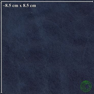 Close-up of dark blue textured fabric measuring 8.5 cm by 8.5 cm.