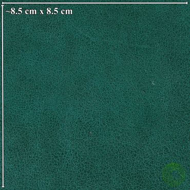 Close-up of textured turquoise material with 8.5 cm x 8.5 cm scale.