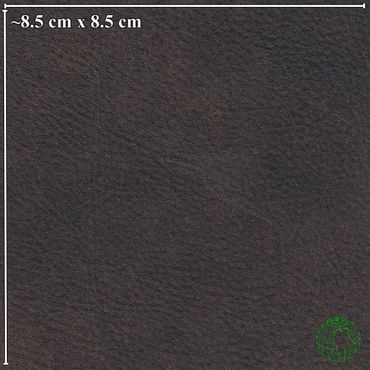 Square piece of black leather approximately 8.5 cm by 8.5 cm.