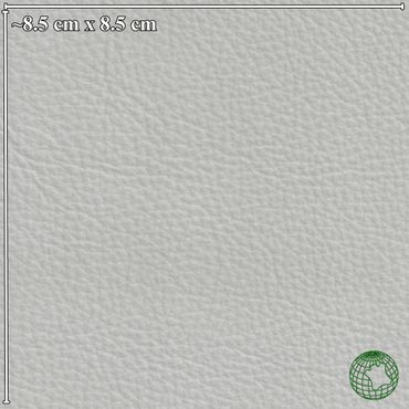 Close-up of textured light gray leather fabric with size annotation and green globe logo.