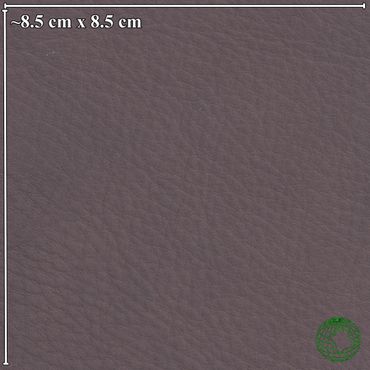 Close-up of dark gray textured leather fabric measuring about 8.5 cm square.