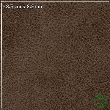 Close-up of brown textured leather material, 8.5 cm by 8.5 cm.