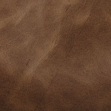 Close-up of textured brown leather material.