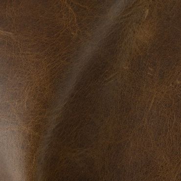Close-up of textured brown leather material.