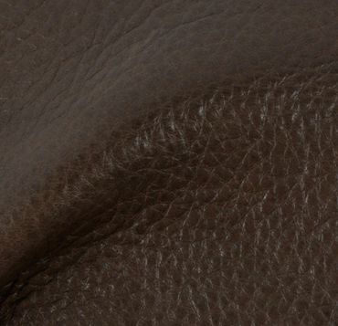 Close-up of textured dark brown leather surface with natural grain patterns.