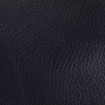 Close-up of black leather texture with natural grain.
