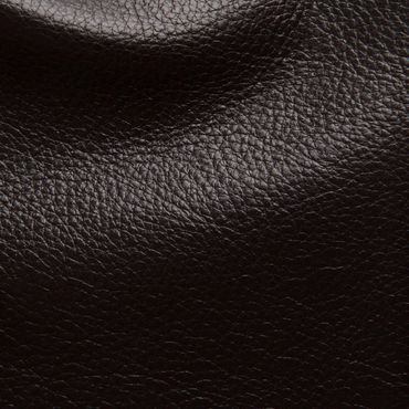 Close-up of textured dark brown leather surface.
