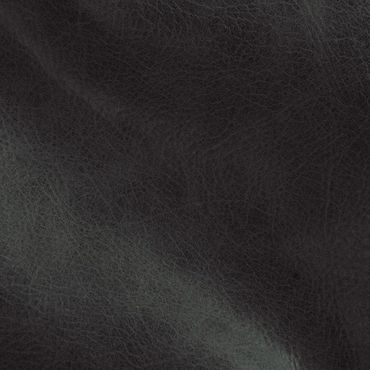 Close-up of dark textured leather surface with subtle creases.