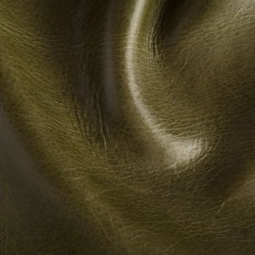 Close-up of textured brown leather with natural creases and shine.