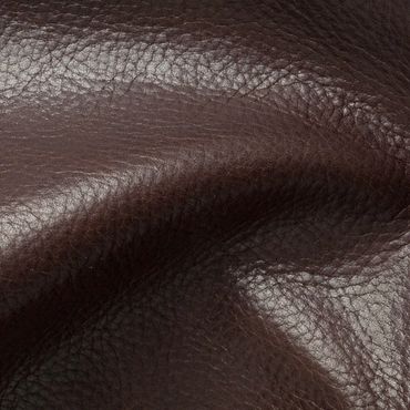 Close-up of textured dark brown leather material.