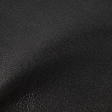 Close-up of textured black leather surface.
