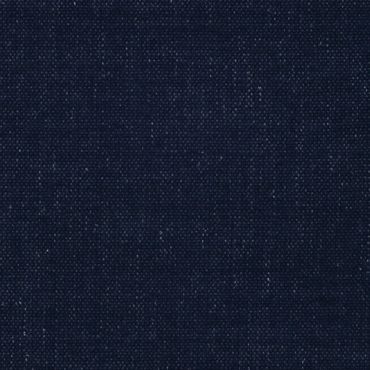 Close-up of dark blue denim fabric texture with visible weave.
