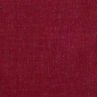 Close-up of textured red fabric with visible weave pattern.