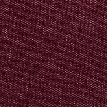 Close-up of dark red textured fabric with subtle speckles.