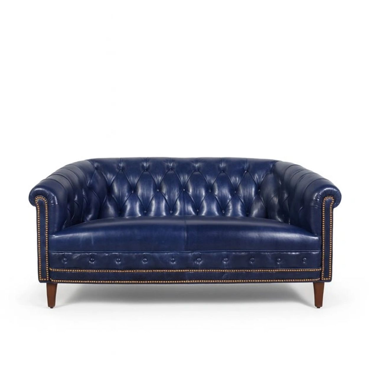Elegant navy blue leather tufted sofa with wooden legs.