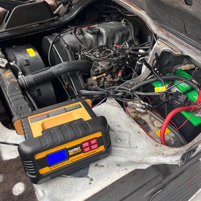 Mitsubishi Delica van on a battery charger