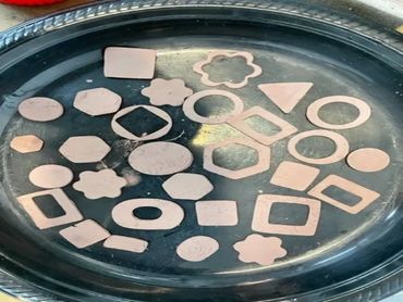 'Raw' charms and shapes to be fired.