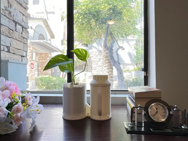 Our Gamalaa - Self watering pot / planter in Office Set up.