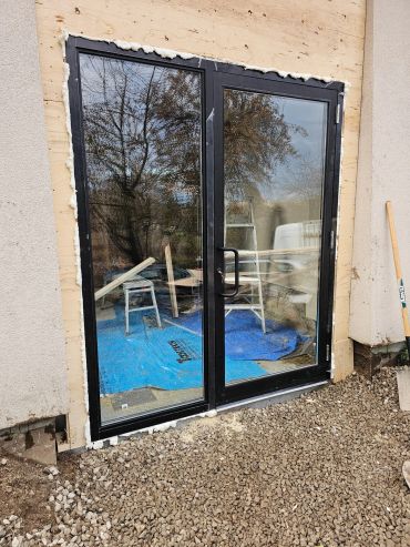Glass door installation with insulation foam