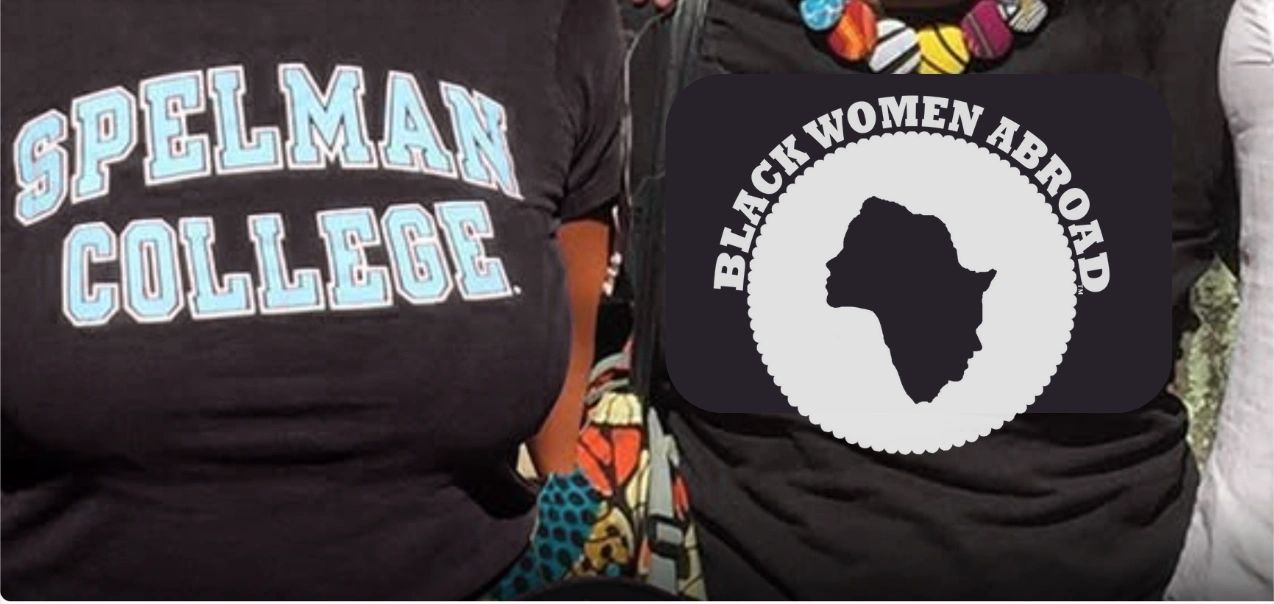 Two women one in a Spelman College t-shirt and one in a Black Women Abroad t-shirt