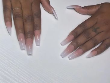 Custom nail extensions using custom acrylic powders.