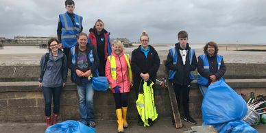Volunteers from the police cadets help out on our monthly beach clean