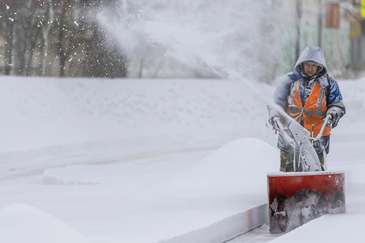 Removing snow in Birmingham, MI