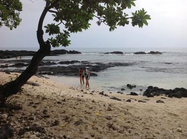 Two people waking in a beach