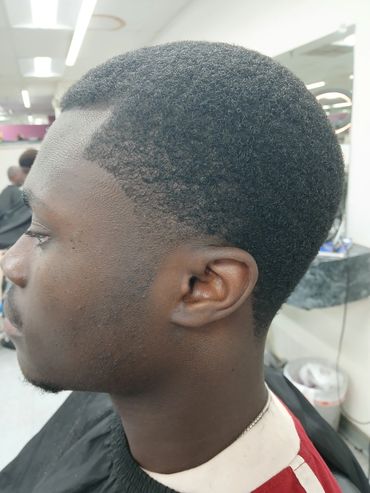 Mid taper on a baby Afro Montgomery Village Gaithersburg DMV