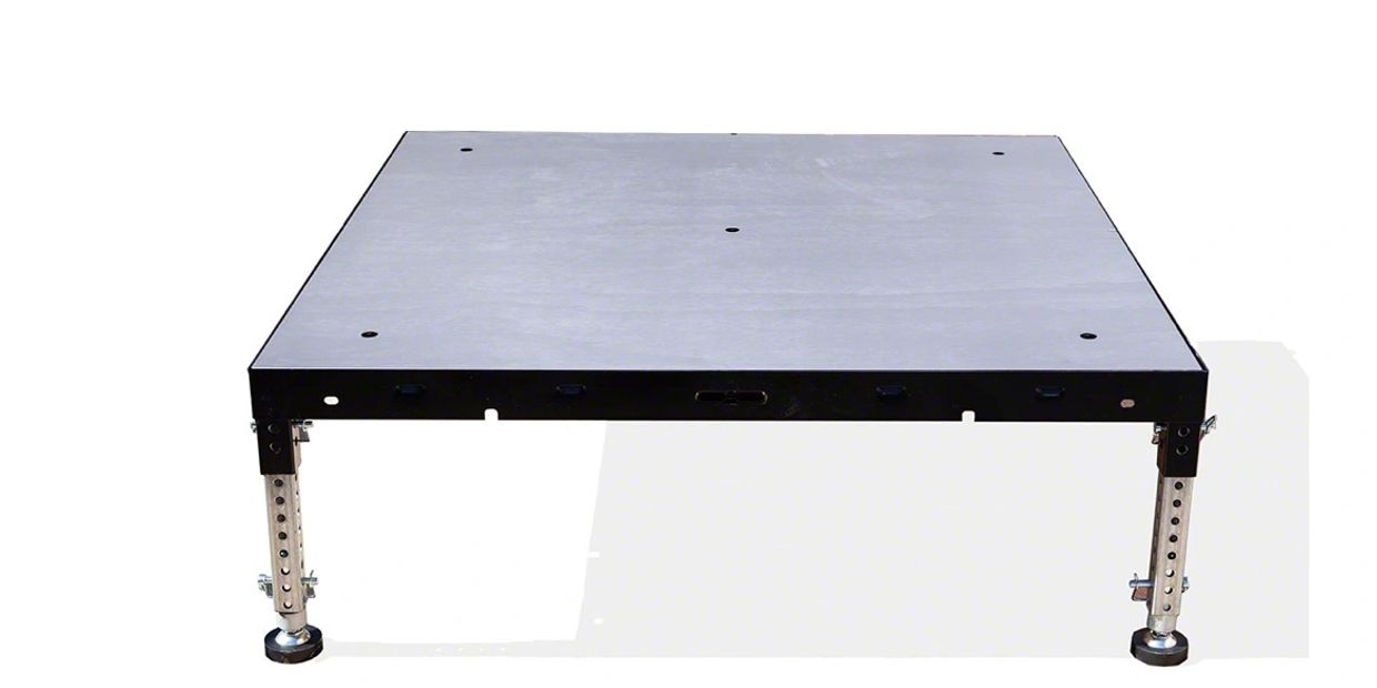 Adjustable metal platform with four legs on a white background.
