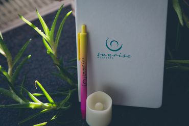 Journal, pen, and battery candle