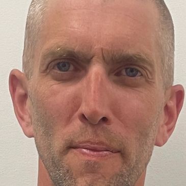 John Campbell Head Coach Atoms White East Side Eagles