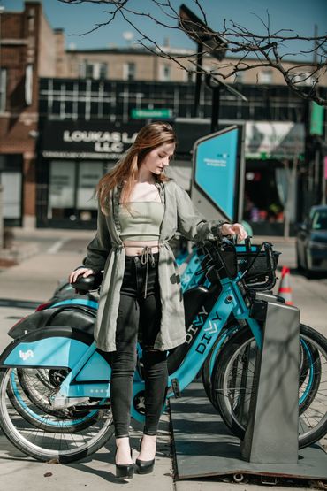 Girl by Chicago Divvy bike station