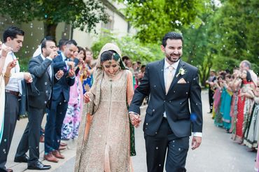 Bride and Groom exiting from wedding ceremony