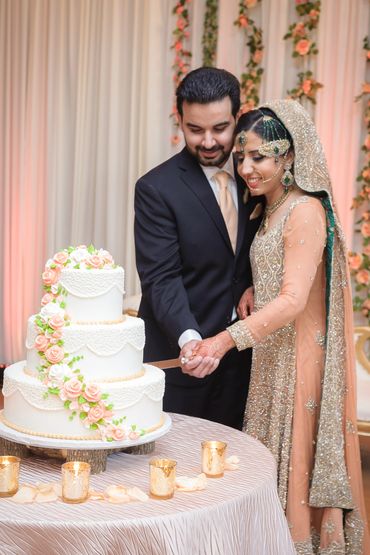 Bride and Groom cutting cake
