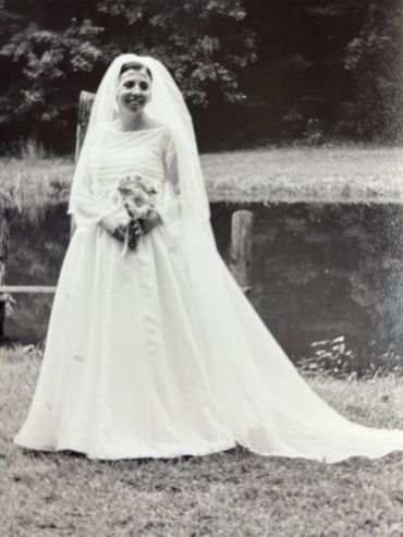 Bride in a custom designed wedding gown.