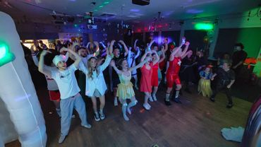 busy dancefloor for a fancy dress birthday party