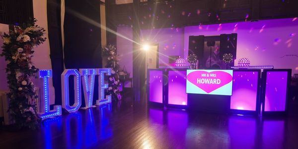 dj with love letters and post box packed dancefloor