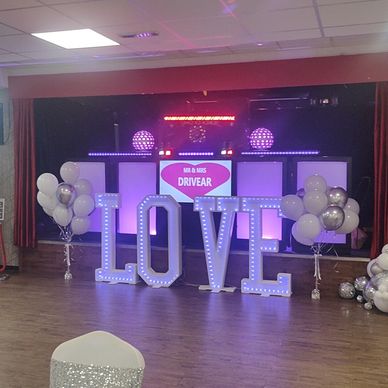 a photo of our DJ setup Large magic mirror photo booth Love Letters and post box at Goldbourne sport