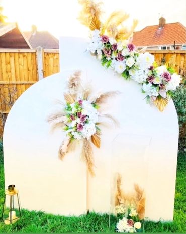 Neutral floral wedding sailboard backdrop