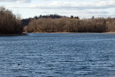 Beautiful scenery of landscape beyond the lake line.
