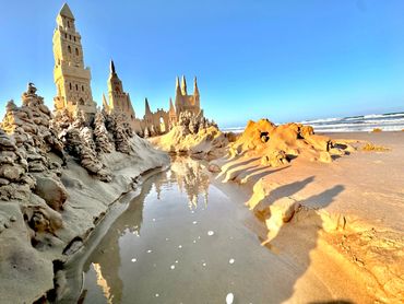 Sandcastle on the beach with waves south padre island scott dodson sand castle