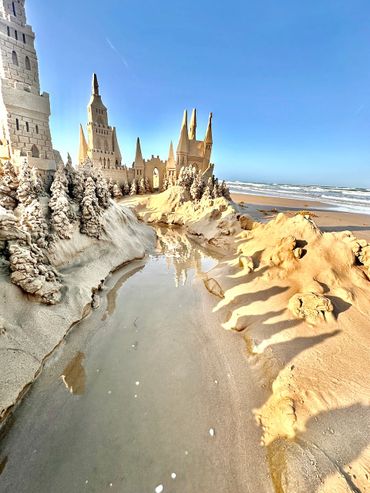 Sandcastle on the beach with waves south padre island scott dodson sand castle