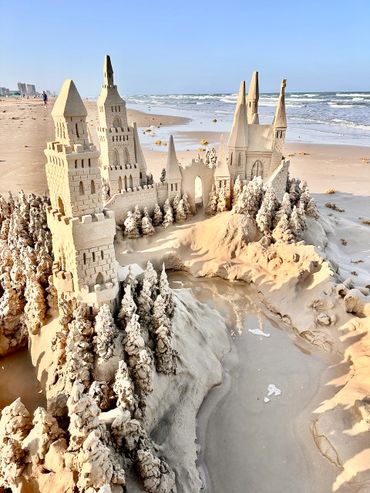 Sandcastle on the beach with waves south padre island scott dodson sand castle