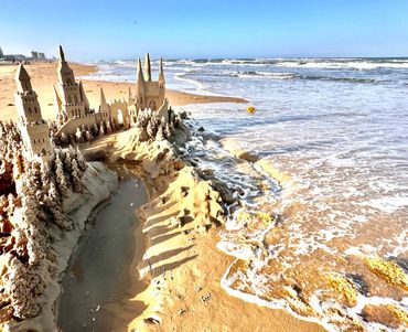 Sandcastle on the beach with waves south padre island scott dodson sand castle