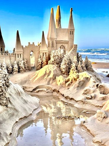 Sandcastle on the beach with waves south padre island scott dodson sand castle