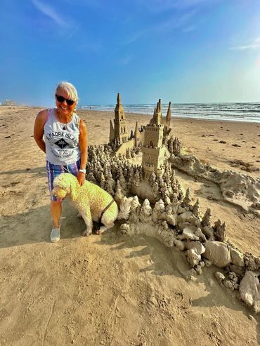 Sandcastle on the beach with waves south padre island Terri Robinson and Riely sand castle