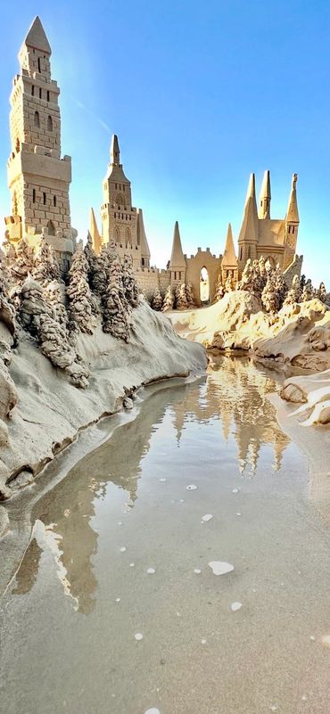 Sandcastle on the beach with waves south padre island scott dodson sand castle