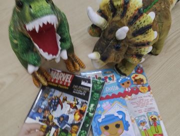 stuffed animals, magnetic "paper" dolls and Marvel Heroes jigsaw puzzles